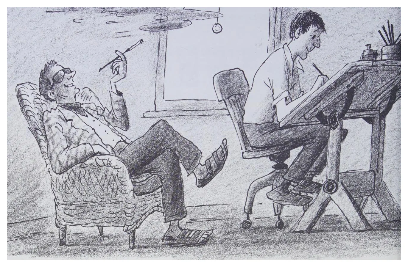 Bill works at the drawing board beside Leo the story man