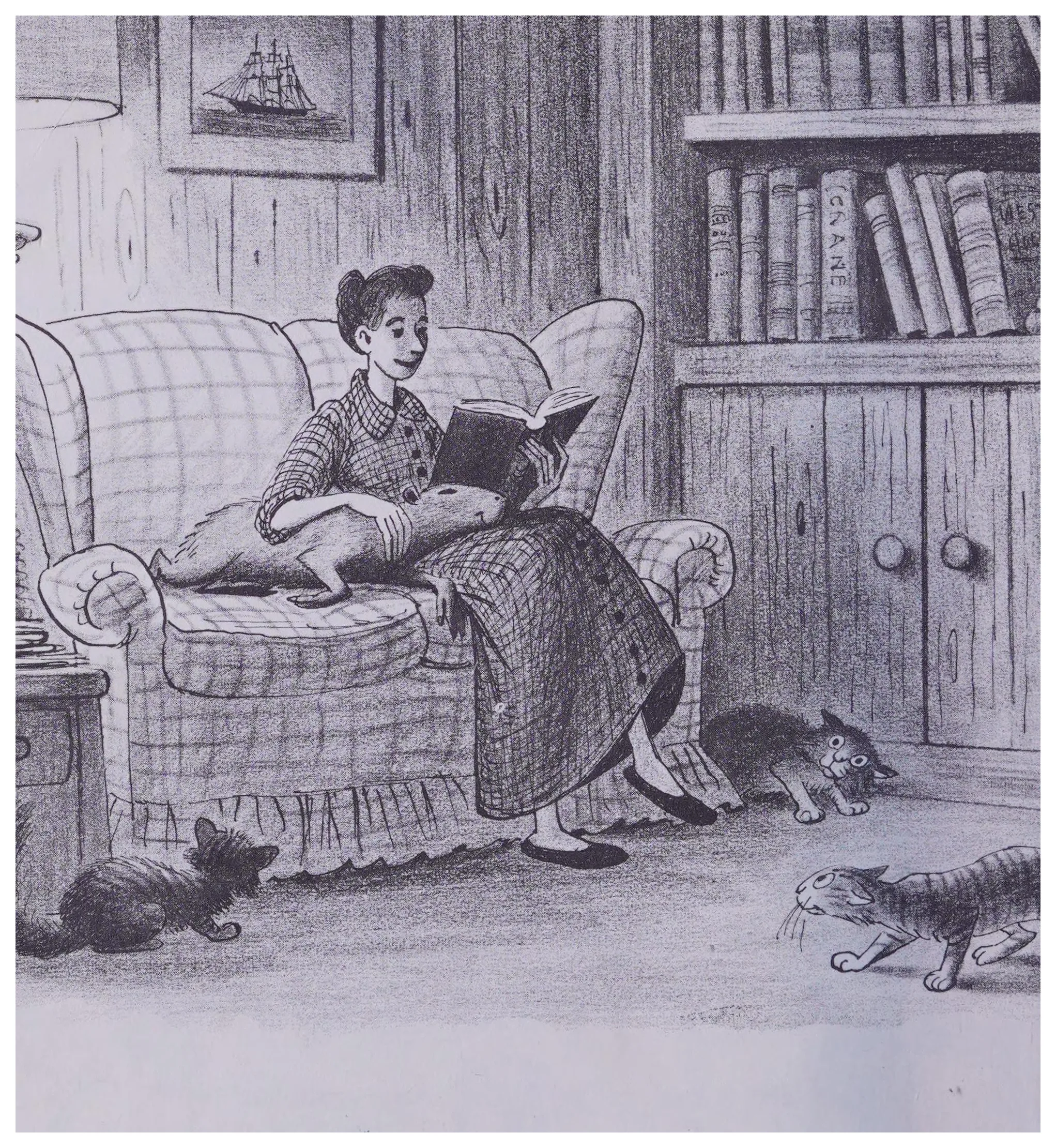 Margaret reads while the jealous cats prowl
