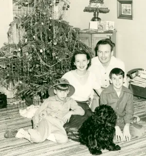 The Peet family photographed together at Christmas, 1951